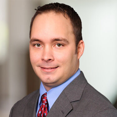 Headshot of Justin Wetzler, Tax Partner