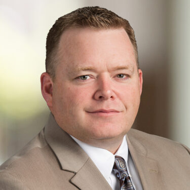 Headshot of Clint Crane, Tax Partner