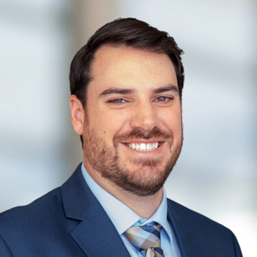 Headshot of Evan Green, Audit Partner