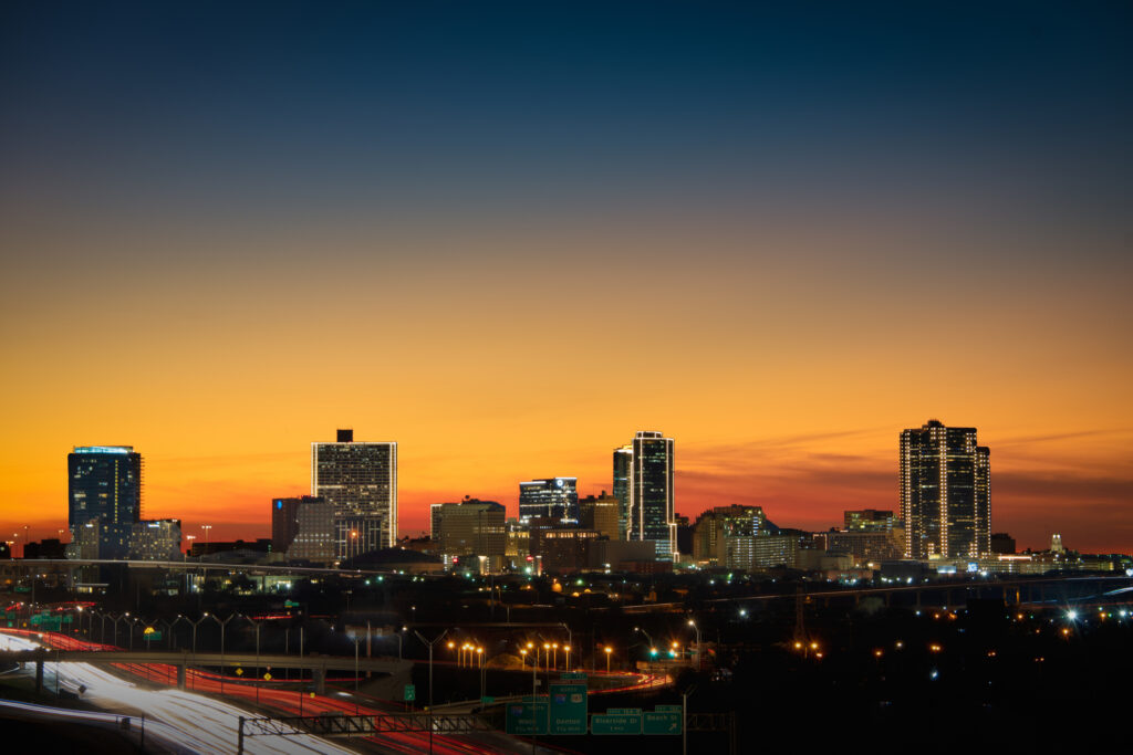 Fort Worth skyline, looking west at Golden Hour with golden orange sky