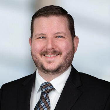 Headshot of Justin Dailey, Audit Partner