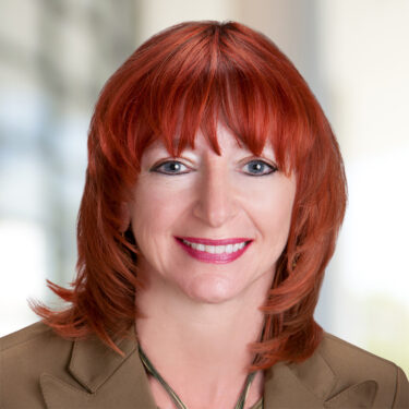 Headshot of Edie Mayo, Tax Partner