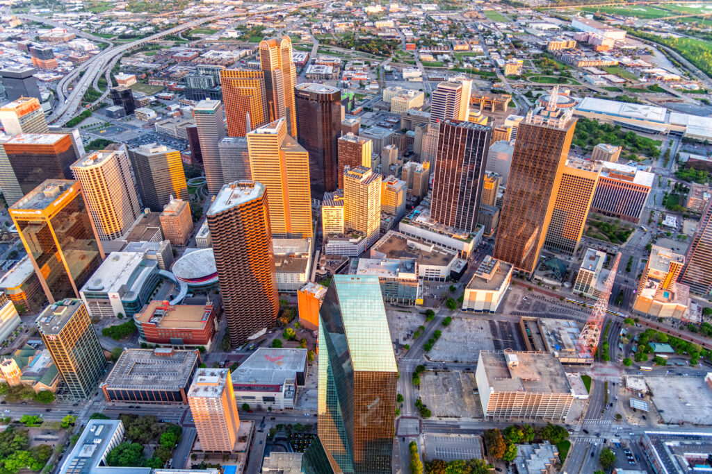 Beautiful downtown Dallas, Texas shot via helicopter from an altitude of about 1500 feet overhead at dusk on an early spring evening.